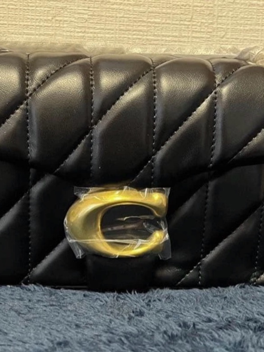 Coach Black Quilted Shoulder Bag with Gold 'C' Accent